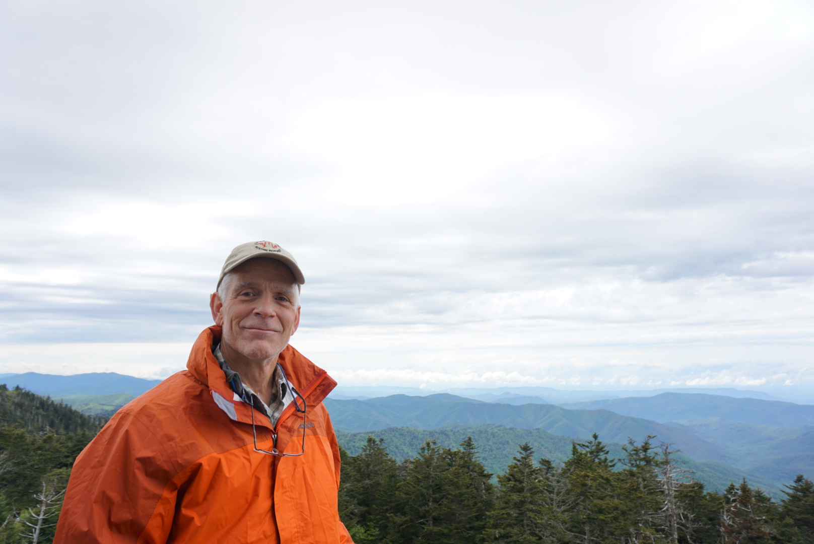 Ken stands in front of a scenic overlook in the Smoky Mountains.