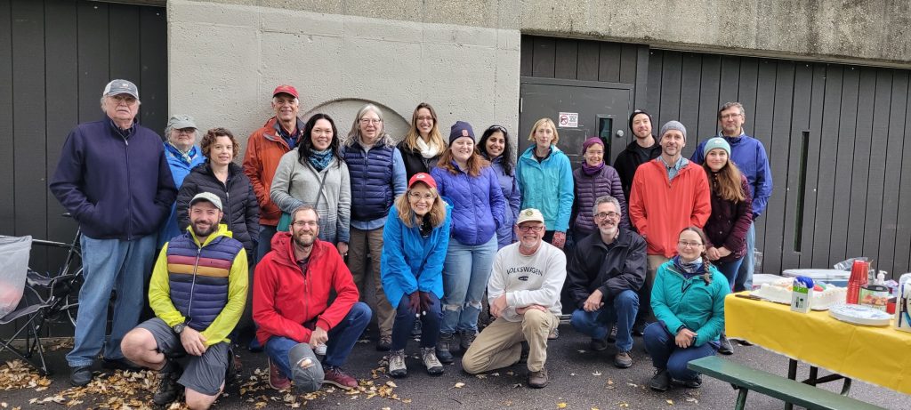 Ken and WGNHS staff stand outside, bundled in jackets, for a picnic.