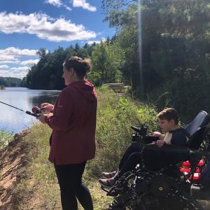 Two program participants fish the Wisconsin River. 