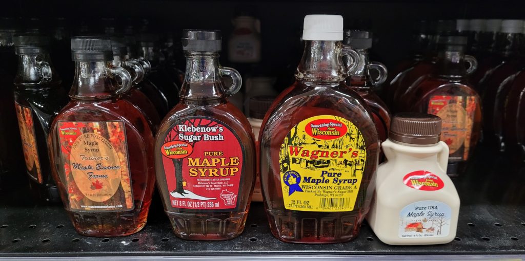 Maple syrup bottles in store shelf