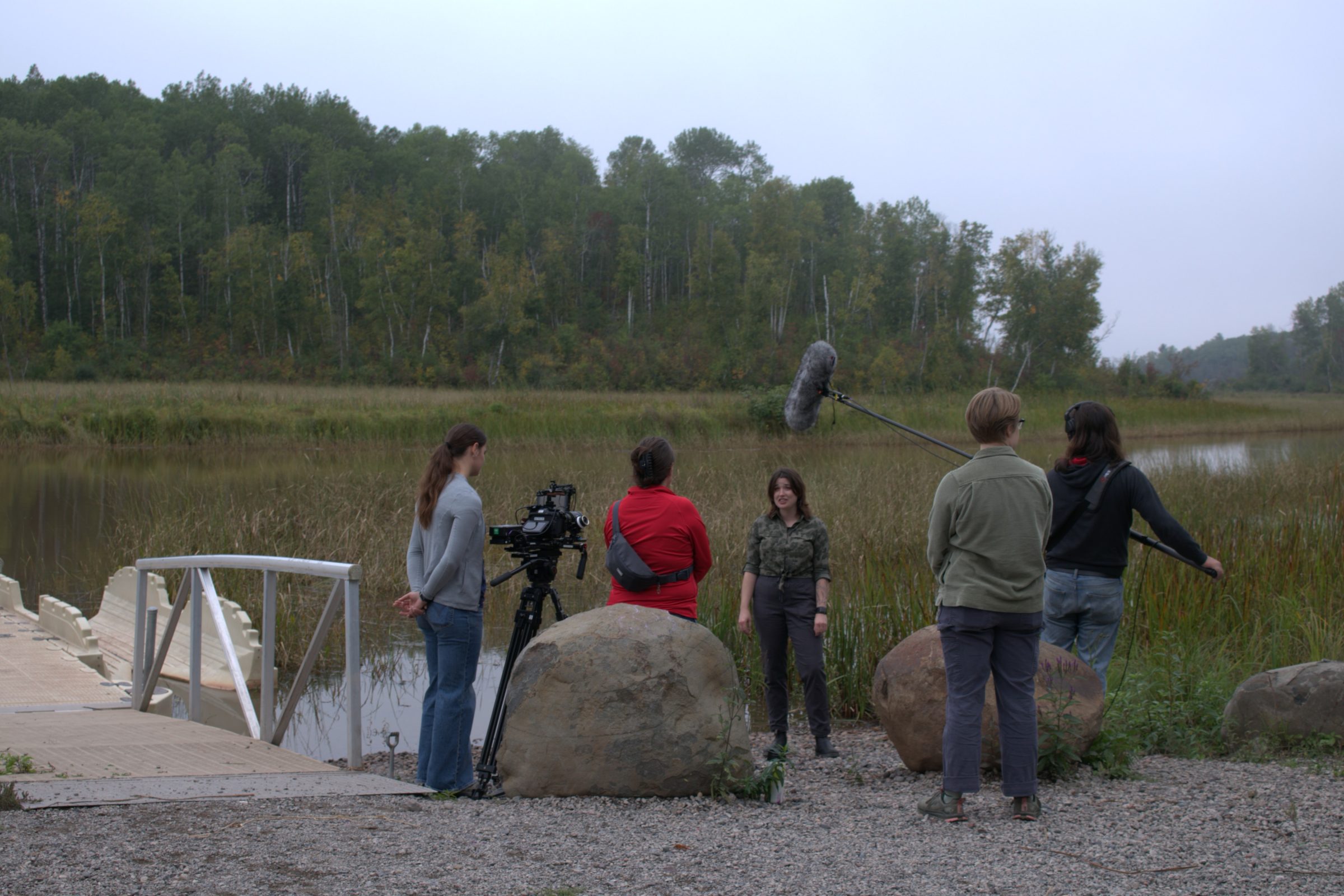 Marketing and Communications Unit staff filming a video on wild rice restoration on the St. Louis River Estuary